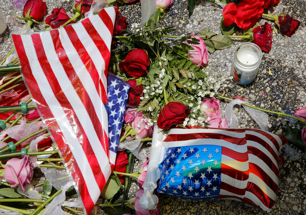 A vigil is seen near the site of the shooting at the Pulse gay night club in Orlando